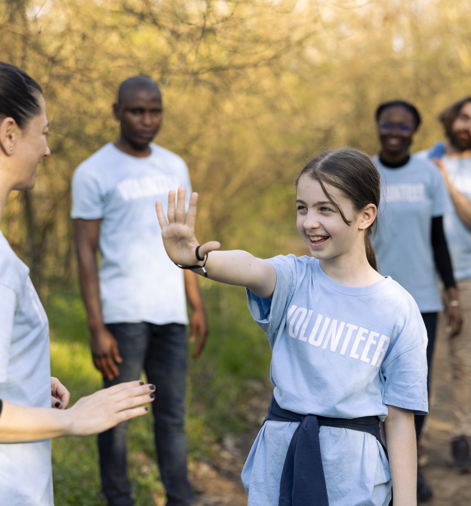 activist congratulating a little child with a high 2025 02 19 23 27 34 utc 1 scaled e1741748331566